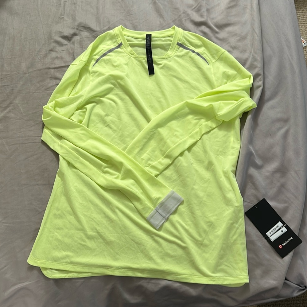 Men’s Lululemon athletic long sleeve shirt with reflective strips on shoulders